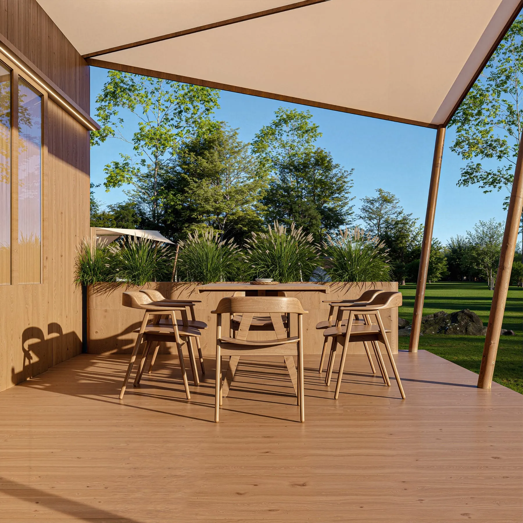 Table de repas sous la toile de la terrasse